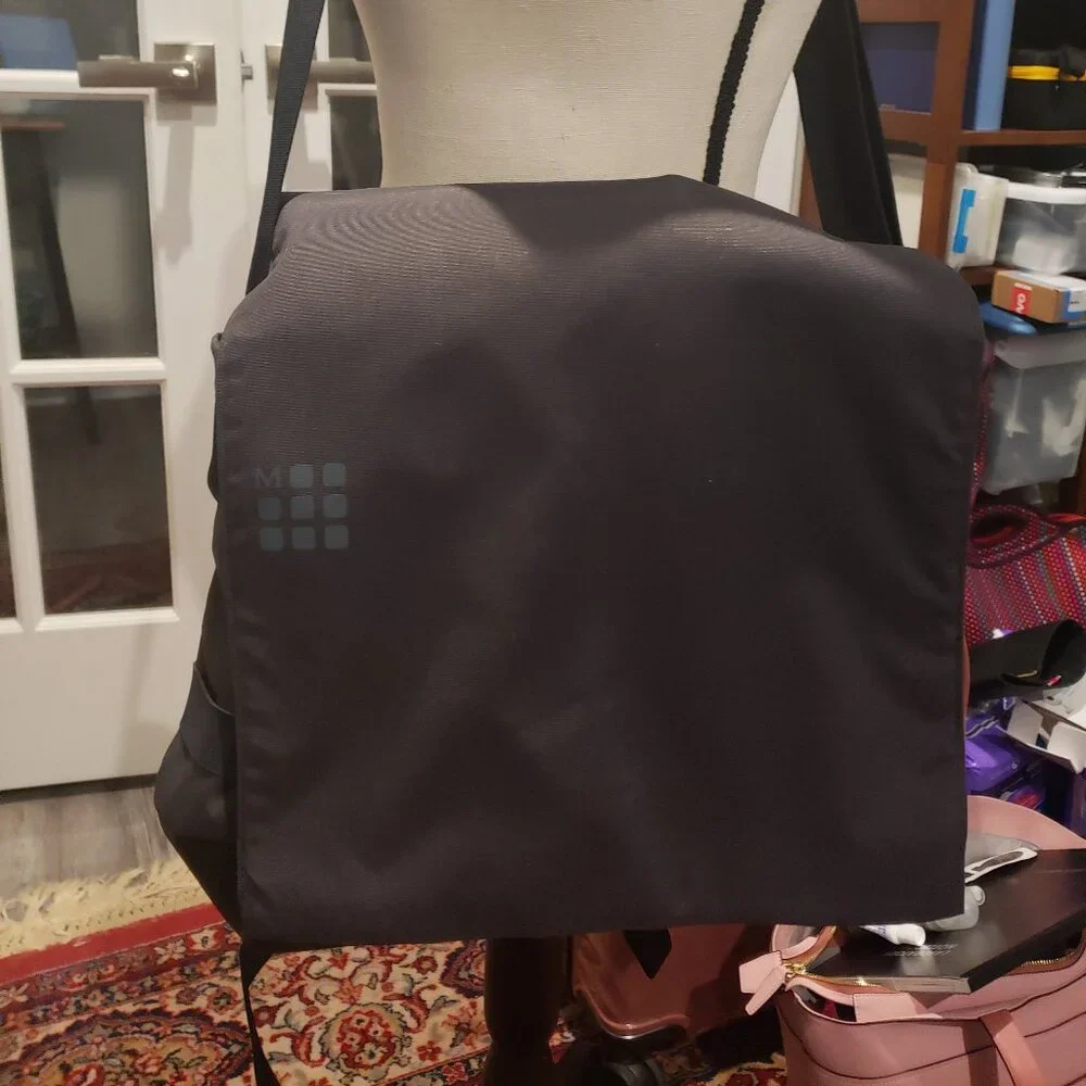 Moleskine Messenger Backpack Computer Bag. Black with Blue and Green Interior